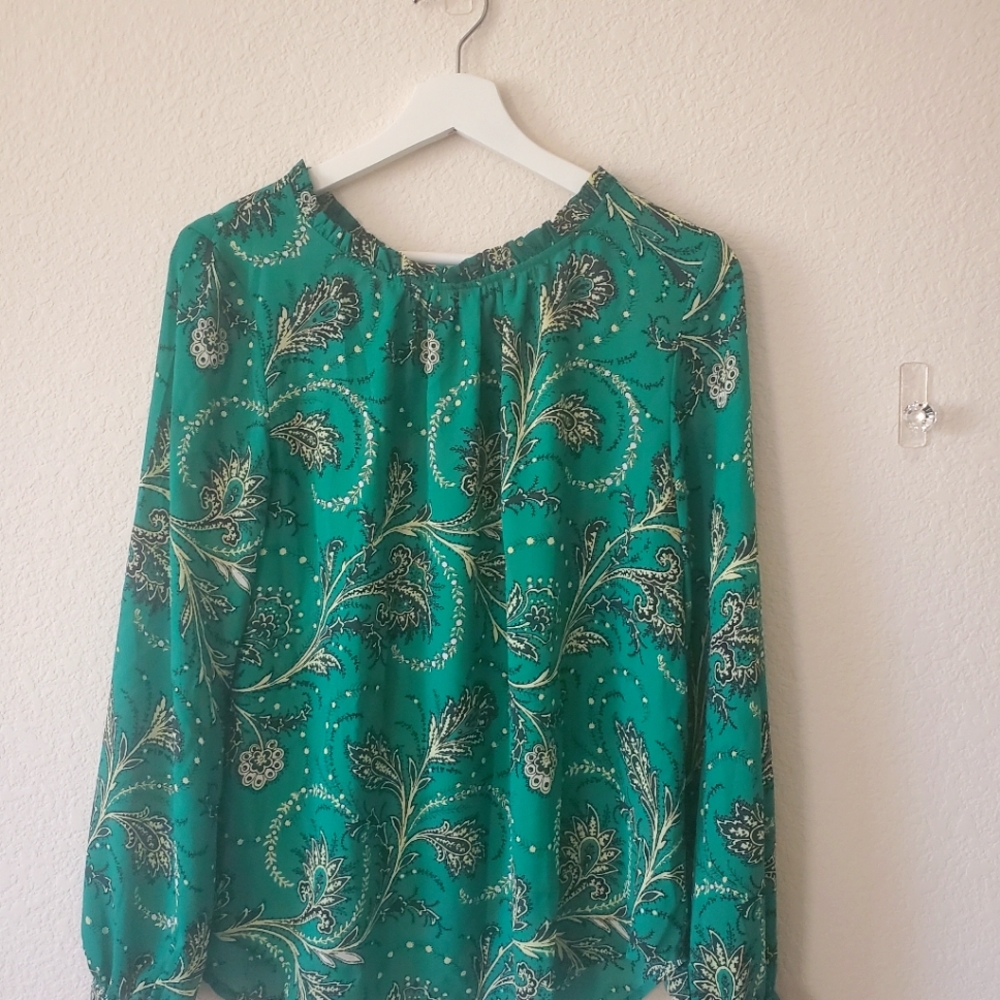Ann Taylor blouse ties in the back.